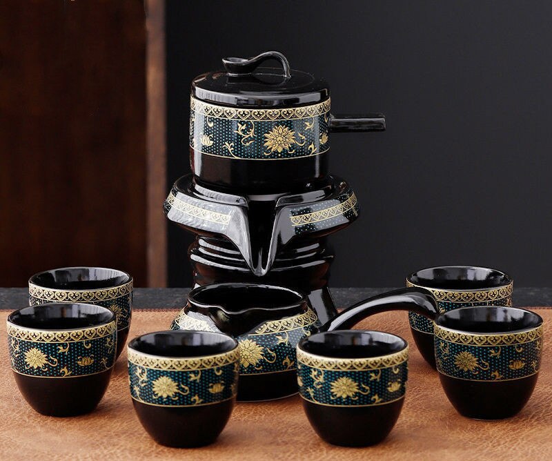 https://www.healthwisdom.shop/cdn/shop/files/8-Pcs-Set-Semi-Automatic-Tea-Sets-Chinese-Ceramic-Purple-Clay-Tea-Set-Tea-Cup-The-Kung-Fu-Teapot-Set-2_800x668.jpg?v=1701548699